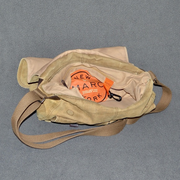 Briefcase from Andrew Marc constructed from a durable canvas with leather trim. - Picture 4 of 4